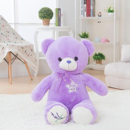 Purple lavender plush toy hugging b..
