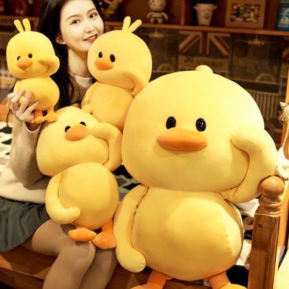 Little yellow duck plush toy pillow..