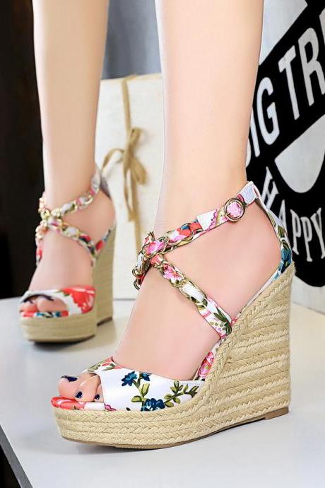 Korean version of high-heeled hemp rope braided wedge satin floral fish mouth hollow metal chain cross strap sandals