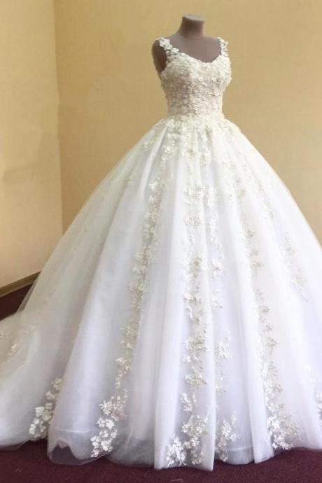 White organza ball gown wedding dress with lace appliquéd v-neck